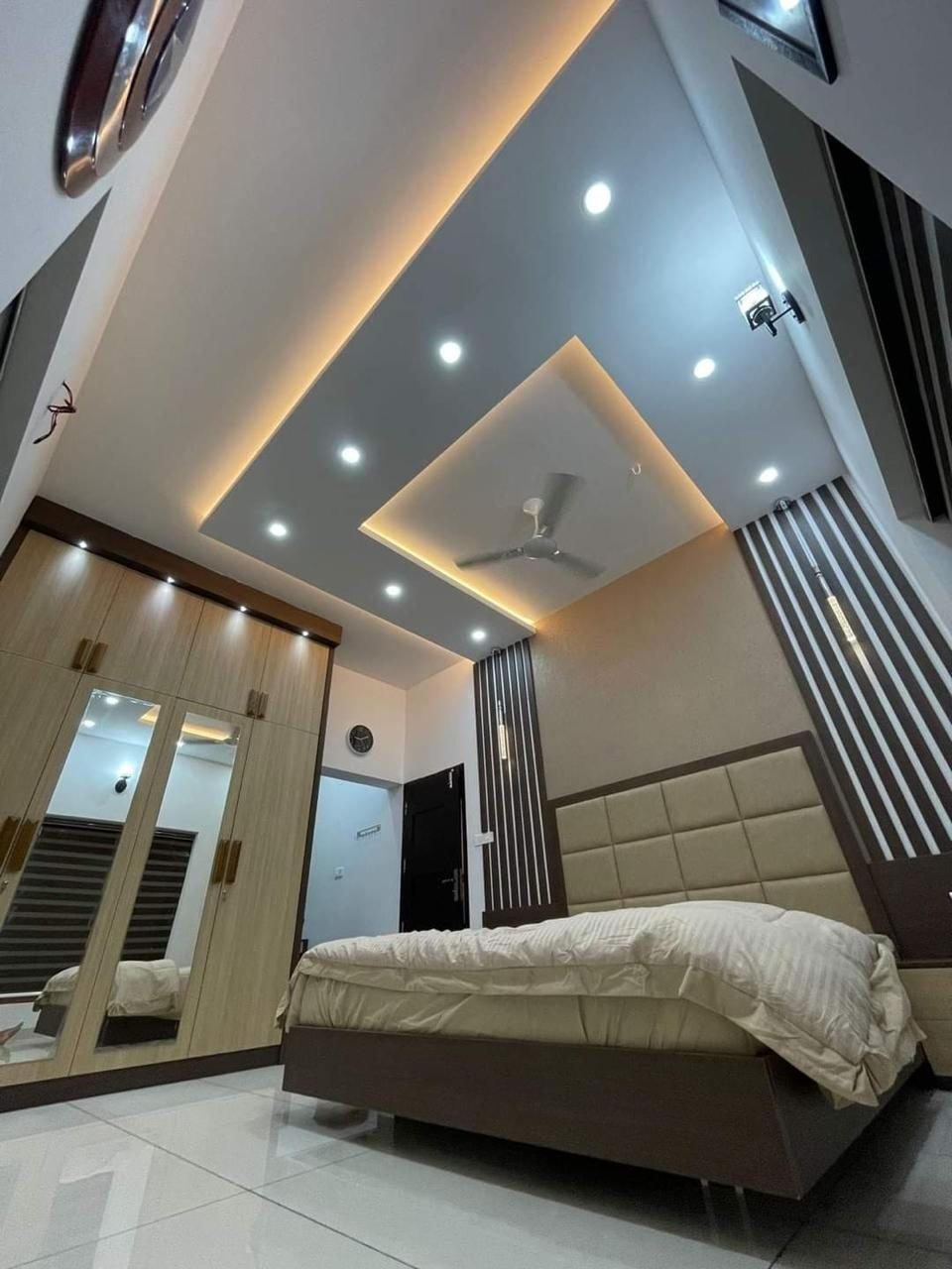 Master bedroom with designer false ceiling, AtoZ Doors and Windows